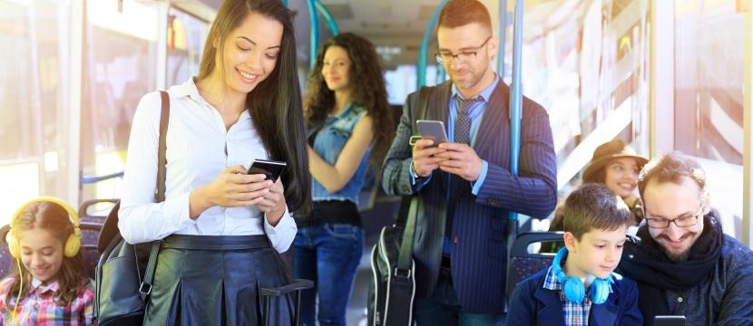 people on train using devices_Aware042018_2.jpg