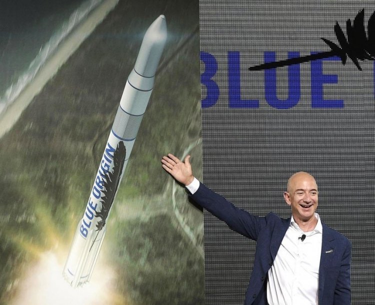 sm.161208-bezos-glenn.750.jpg