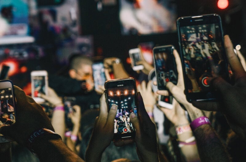 smartphones-in-hands-unsplash.jpg