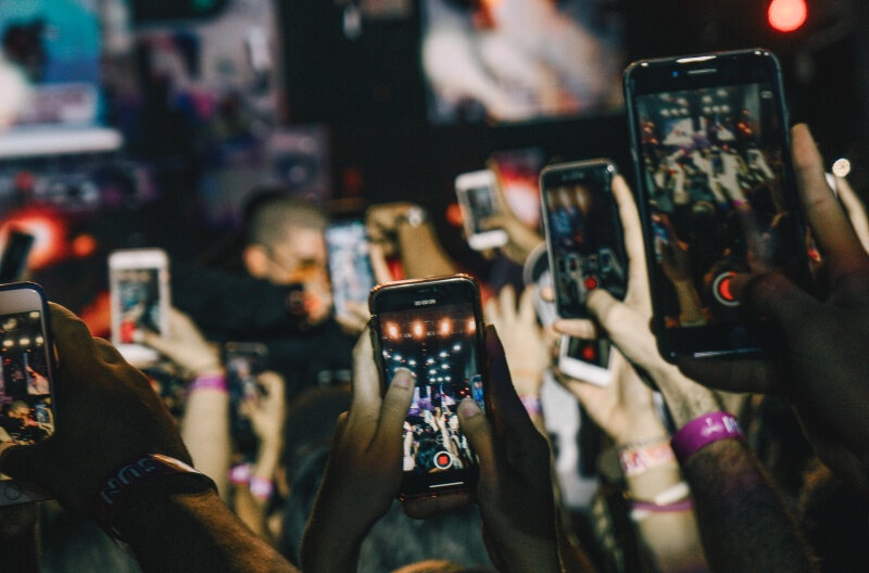 smartphones-in-hands-unsplash.jpg